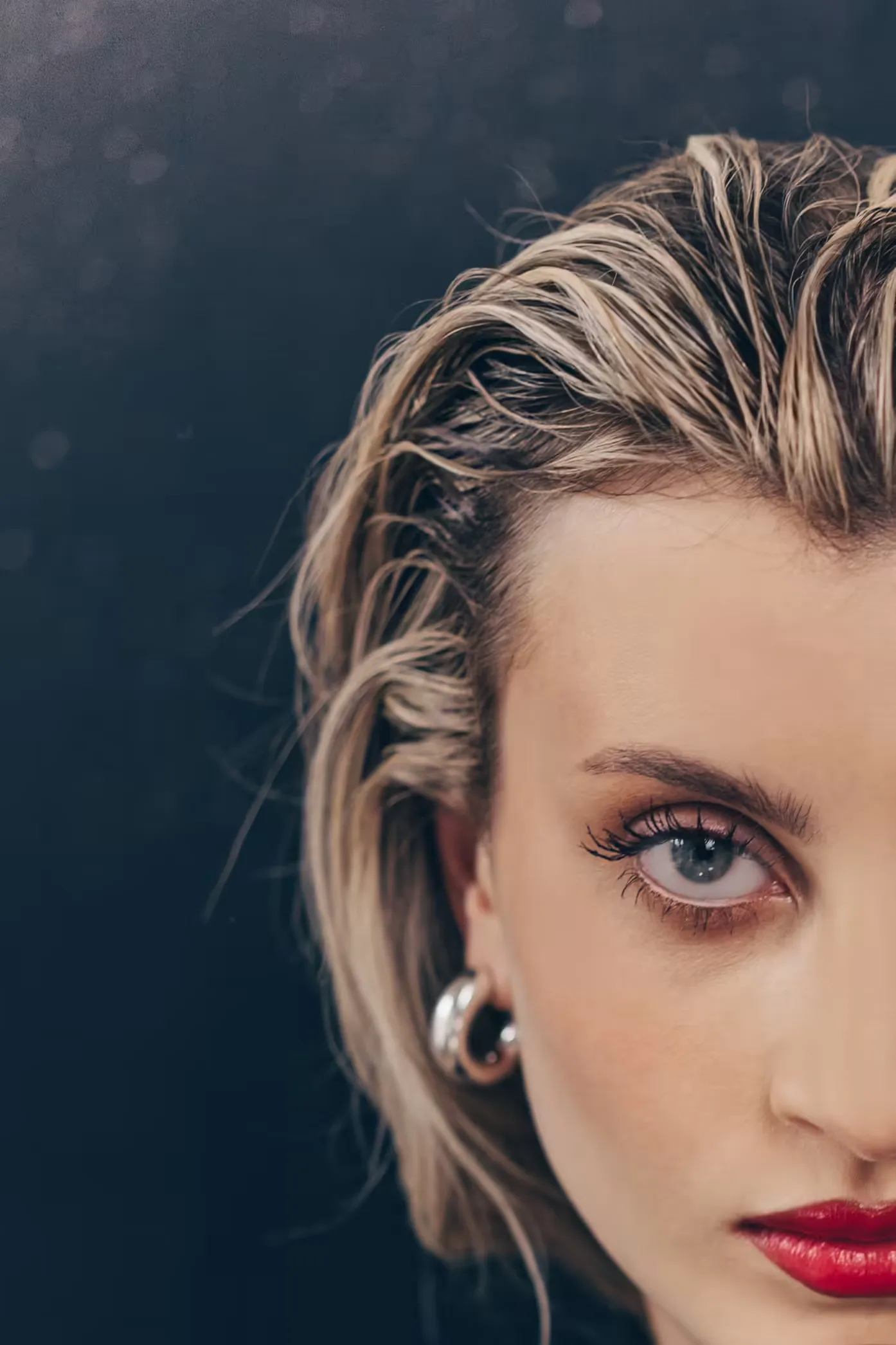 Professional cosmetic tattoo artist working on eyebrow microblading